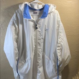 A white and Carolina blue track suit.